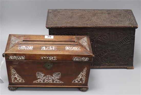 A Victorian carved wood tea caddy and a mother of pearl inset rosewood tea caddy longest 37cm